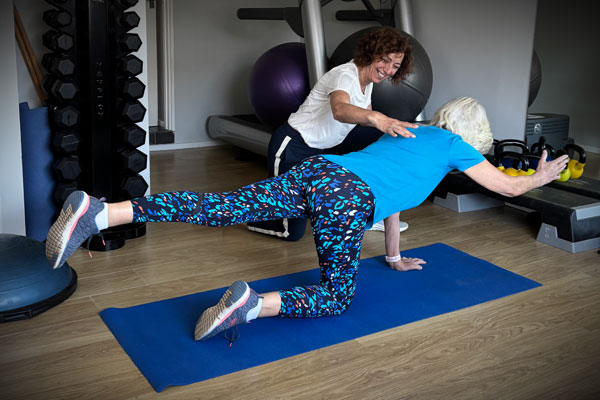 Woman doing Bird Dog excercise
